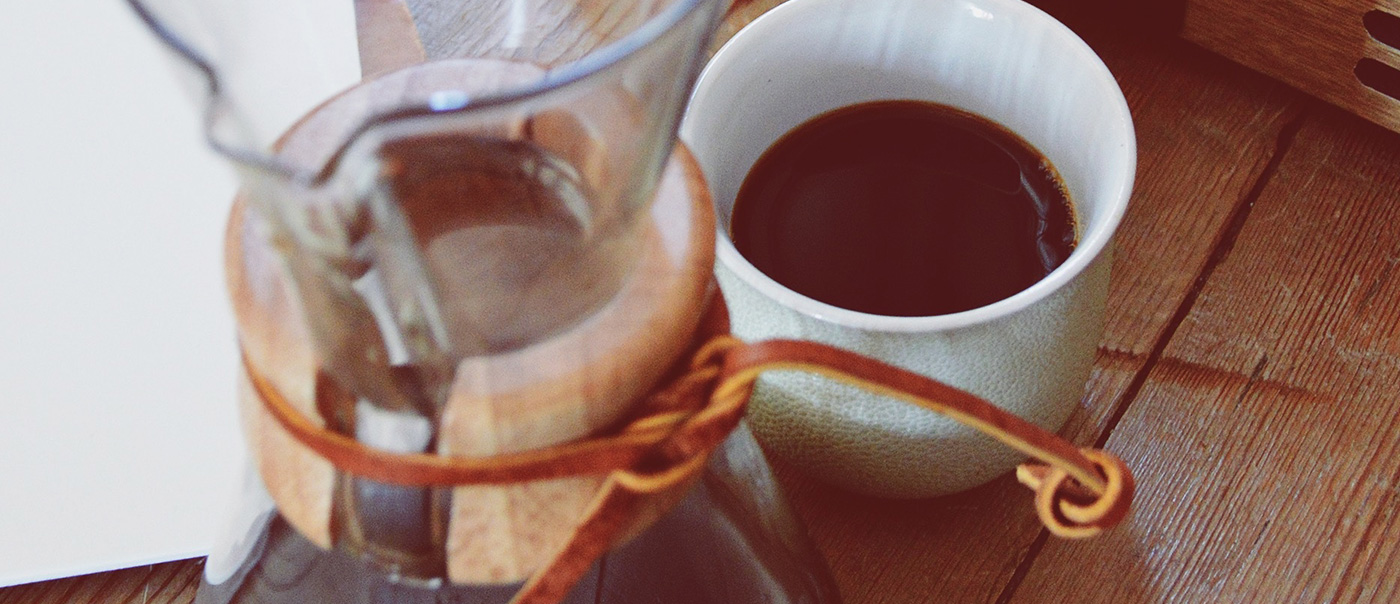 Coffee carafe next to mug