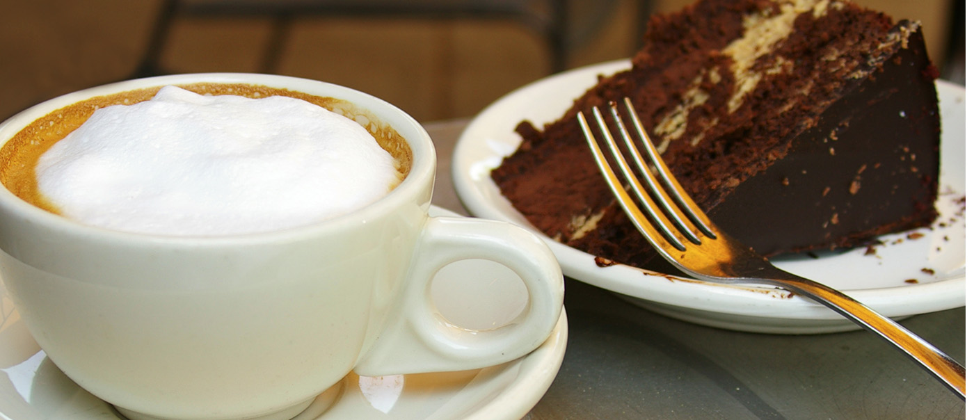 Coffee with a side of cake.