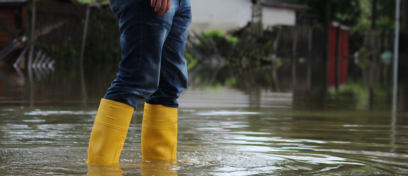 Rubber boots in flood waters