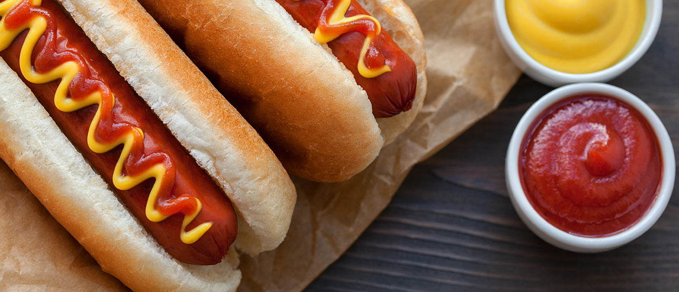 Hot dogs on a bun.