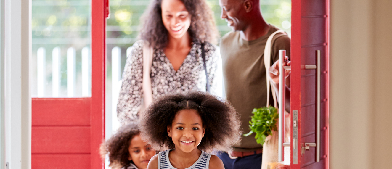 The Societal Benefits of Homeownership - happy family at home
