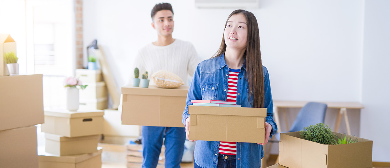 Young couple moving into house