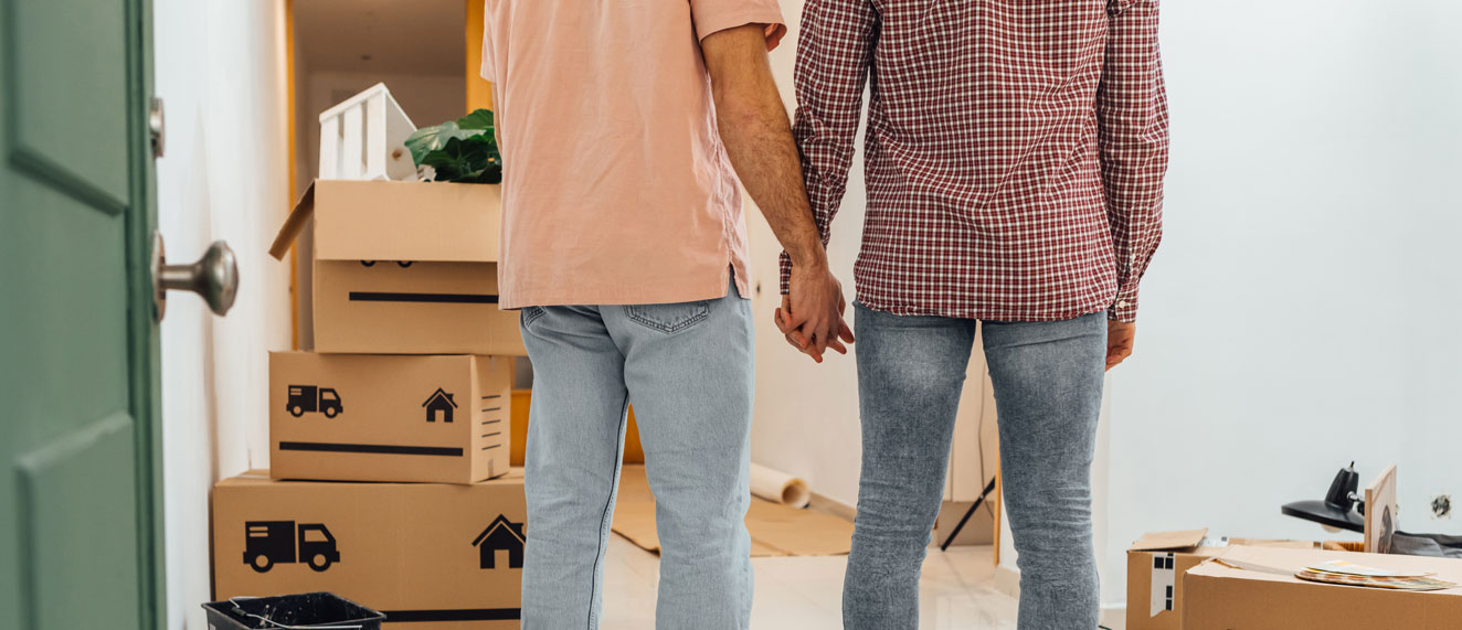 Gay couple moving into house.