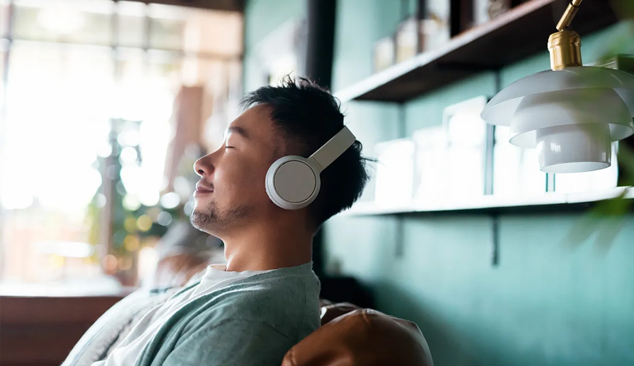 Man listening to music in music.
